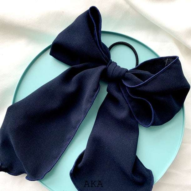 Bow tie hair band rubber band Orazek UK Ltd